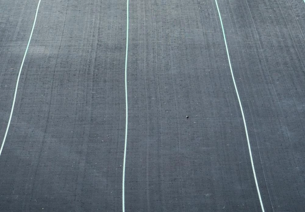 RSI Landscape Fabric & Stakes Premium Landscape Fabric (Common: 4-ft x 50-ft; Actual: x 50-ft) 4 RSI Landscape Fabric & Stakes Premium Landscape Fabric (Common: 4-ft x 50-ft; Actual: x 50-ft) - Image 4